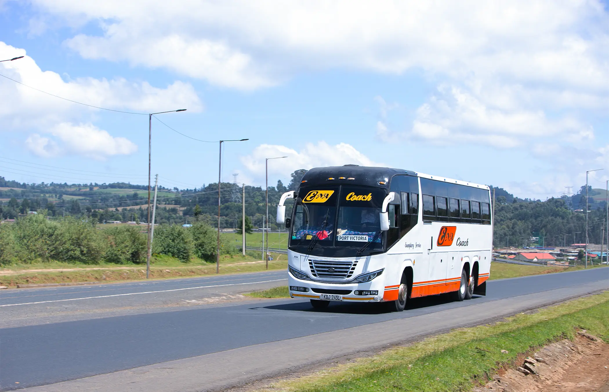 ENA Coach bus travelling through the Kenyan countryside